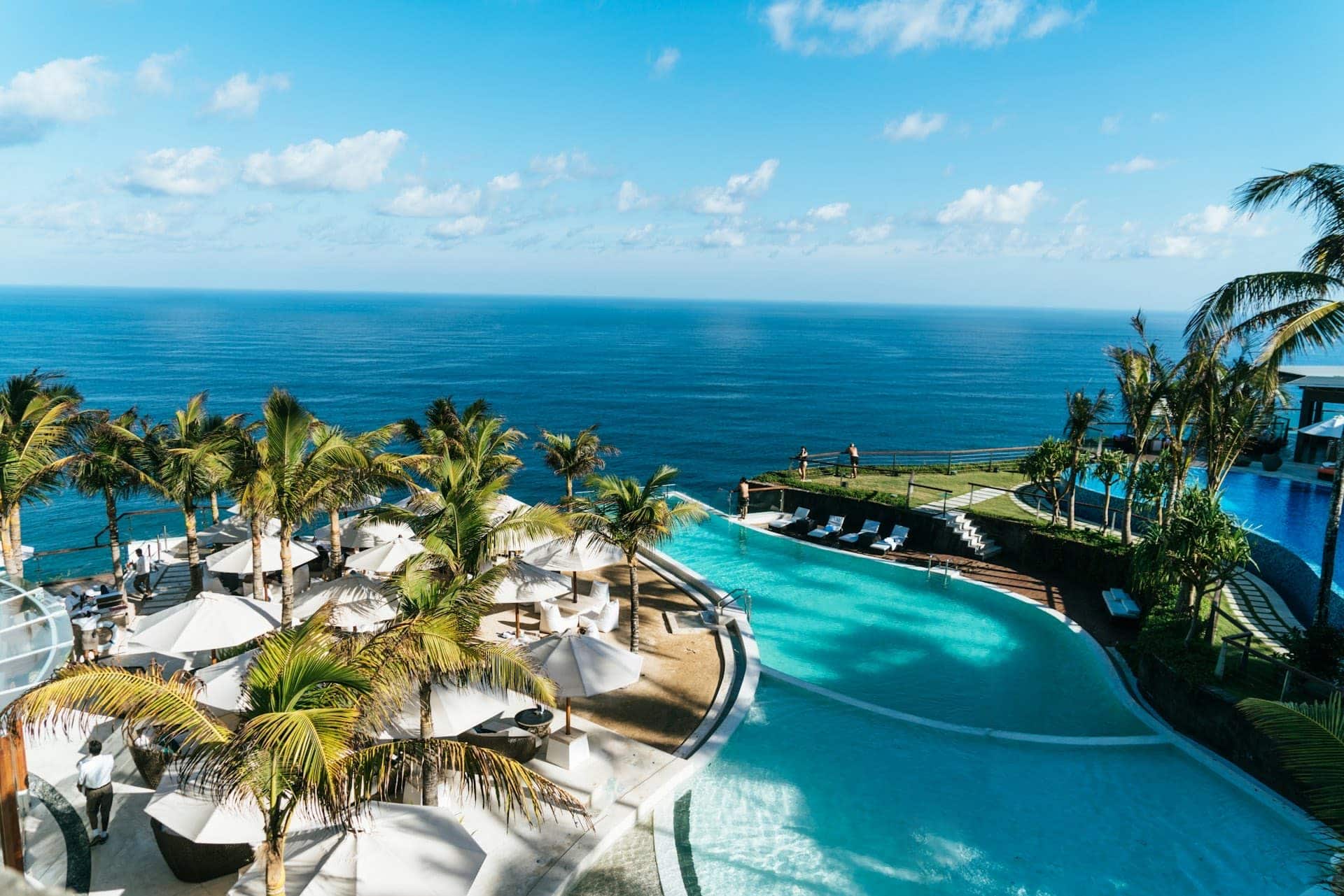 Resort-style swimming pool overlooking the ocean